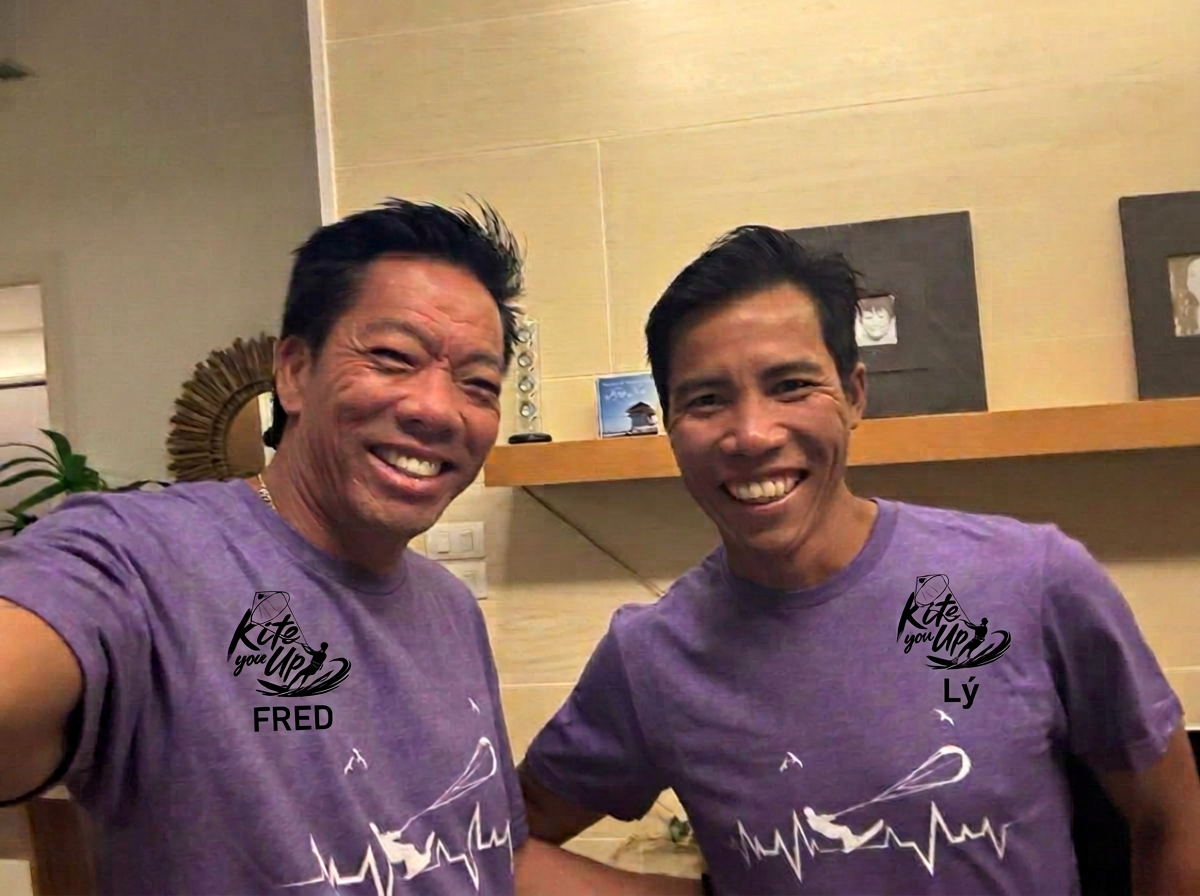 Fred and Lý wearing KITE YOU UP shirts